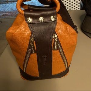 Valentina Leather sling/backpack style purse. Dark Amber/Dark Brown trim.
